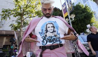 New Jersey performer and Britney Spears supporter &amp;quot;Brennyboombox&amp;quot; shows off his T-shirt outside a hearing concerning the pop singer&#39;s conservatorship at the Stanley Mosk Courthouse, Friday, Nov. 12, 2021, in Los Angeles. (AP Photo/Chris Pizzello)
