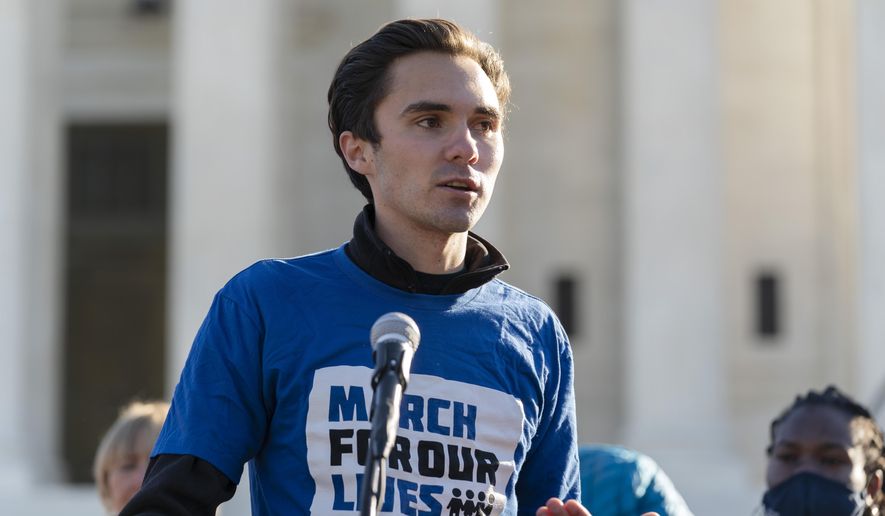 Parkland survivor and activist David Hogg speaks during a rally outside of the U.S. Supreme Court in Washington, Wednesday, Nov. 3, 2021. The Supreme Court is set to hear arguments in a gun rights case that centers on New York&#x27;s restrictive gun permit law and whether limits the state has placed on carrying a gun in public violate the Second Amendment. (AP Photo/Jose Luis Magana)