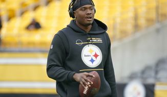 Pittsburgh Steelers quarterback Dwayne Haskins warms up before an NFL football game in Pittsburgh, Sunday, Nov. 14, 2021. (AP Photo/Gene J. Puskar)