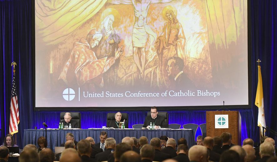 FILE - The United States Conference of Catholic Bishops holds its Fall General Assembly meeting on Tuesday, Nov. 12, 2019 in Baltimore.  While some US Catholic bishops continue to denounce President Joe Biden for his support of legal abortion, their conference as a whole is likely to avoid direct criticism of him at its upcoming national meeting.  (AP Photo/Steve Ruark, File)