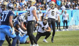 New Orleans Saints kicker Brian Johnson (6) watches as he misses his second extra point of the game in the second half of an NFL football game against the Tennessee Titans Sunday, Nov. 14, 2021, in Nashville, Tenn. (AP Photo/John Amis)