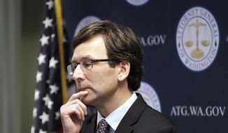 FILE - Washington state Attorney General Bob Ferguson looks on during a news conference in Seattle on Dec. 17, 2019. Ferguson rejected a half-billion-dollar settlement offer, and now he&#x27;s taking the state&#x27;s case against the nation&#x27;s three biggest drug distributors to trial Monday, Nov. 15, 2021. He says they must be held accountable for their role in the opioid crisis. (AP Photo/Elaine Thompson, File)