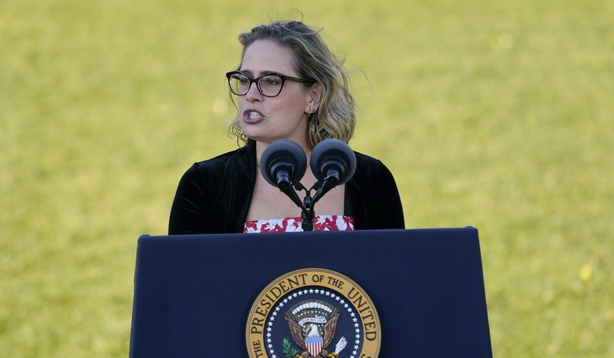 Sen. Kyrsten Sinema, D-Ariz., speaks before President Joe Biden signs the $1.2 trillion bipartisan infrastructure bill into law during a ceremony on the South Lawn of the White House in Washington, Monday, Nov. 15, 2021. (AP Photo/Susan Walsh) ** FILE **