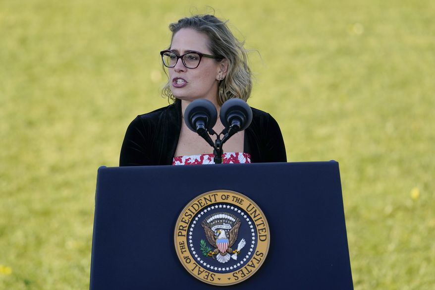 Sen. Kyrsten Sinema, D-Ariz., speaks before President Joe Biden signs the $1.2 trillion bipartisan infrastructure bill into law during a ceremony on the South Lawn of the White House in Washington, Monday, Nov. 15, 2021. (AP Photo/Susan Walsh) ** FILE **