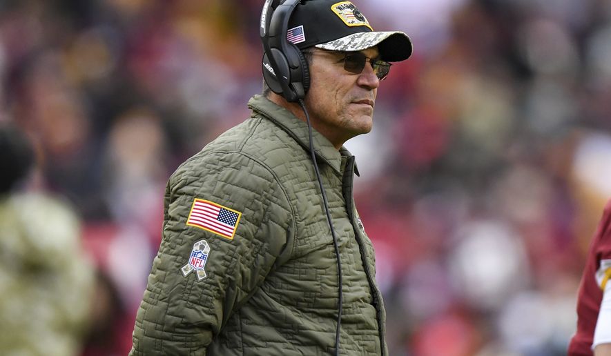 Washington Football Team head coach Ron Rivera looks on from the sideline during the second half of an NFL football game against the Tampa Bay Buccaneers, Sunday, Nov. 14, 2021, in Landover, Md. (AP Photo/Terrance Williams) **FILE**