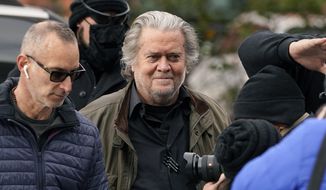 Former White House strategist Steve Bannon arrives at the FBI Washington Field Office, Monday, Nov., 15, 2021, in Washington. Bannon has surrendered to federal authorities to face contempt charges after defying a subpoena from a House committee investigating January&#39;s insurrection at the U.S. Capitol. Bannon was taken into custody Monday morning. (AP Photo/Carolyn Kaster)