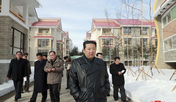 This undated photo provided on Nov. 16, 2021, by the North Korean government, North Korean leader Kim Jong Un, center, inspects a major development project site in Samjiyon, Ryanggang province, North Korea. Independent journalists were not given access to cover the event depicted in this image distributed by the North Korean government. The content of this image is as provided and cannot be independently verified. Korean language watermark on image as provided by source reads: &quot;KCNA&quot; which is the abbreviation for Korean Central News Agency. (Korean Central News Agency/Korea News Service via AP) **FILE**