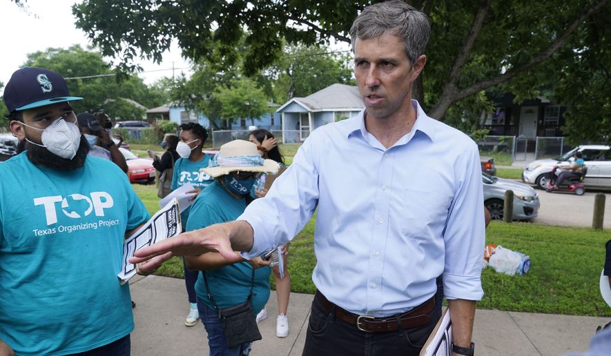 Democrat Beto O&#x27;Rourke speaks to Texas Organizing Project volunteers preparing to canvass a neighborhood in this June 9, 2021, photo. O’Rourke is running for governor of Texas. The former El Paso congressman announced his decision Monday, Nov. 15. (AP Photo/LM Otero) **FILE**