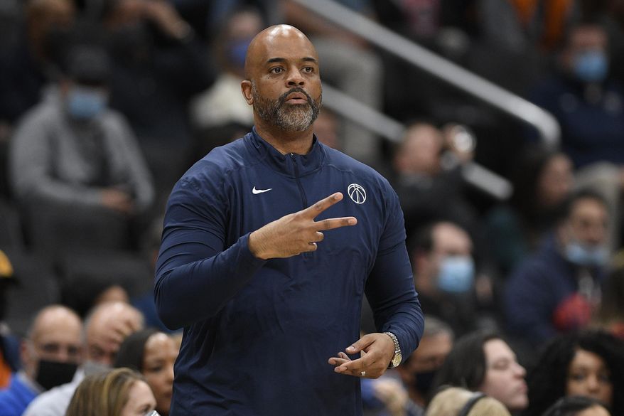Washington Wizards coach Wes Unseld Jr. gestures during the first half of the team&#39;s NBA basketball game against the New Orleans Pelicans, Monday, Nov. 15, 2021, in Washington. (AP Photo/Nick Wass)