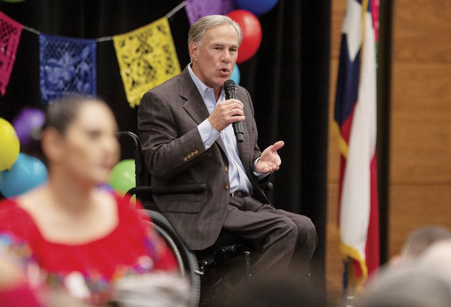 Gov. Greg Abbott speaks on a variety of matters including a border wall, razor wire, critical race theory, election laws, mail-in ballots, voter fraud, and more at the Midland Chapter of the Republican National Hispanic Assembly&#39;s Reagan Lunch at the Bush Convention Center Friday, Nov. 5, 2021, in Midland, Texas. (Jacob Ford/Odessa American via AP) ** FILE **