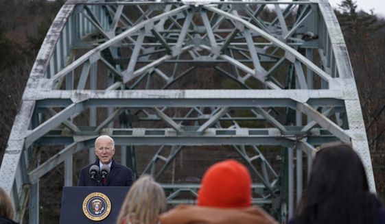 President Joe Biden speaks during a visit to the NH 175 bridge over the Pemigewasset River to promote infrastructure spending Tuesday, Nov. 16, 2021, in Woodstock, N.H. (AP Photo/Evan Vucci)