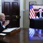 President Joe Biden meets virtually with Chinese President Xi Jinping from the Roosevelt Room of the White House in Washington, Monday, Nov. 15, 2021. (AP Photo/Susan Walsh)