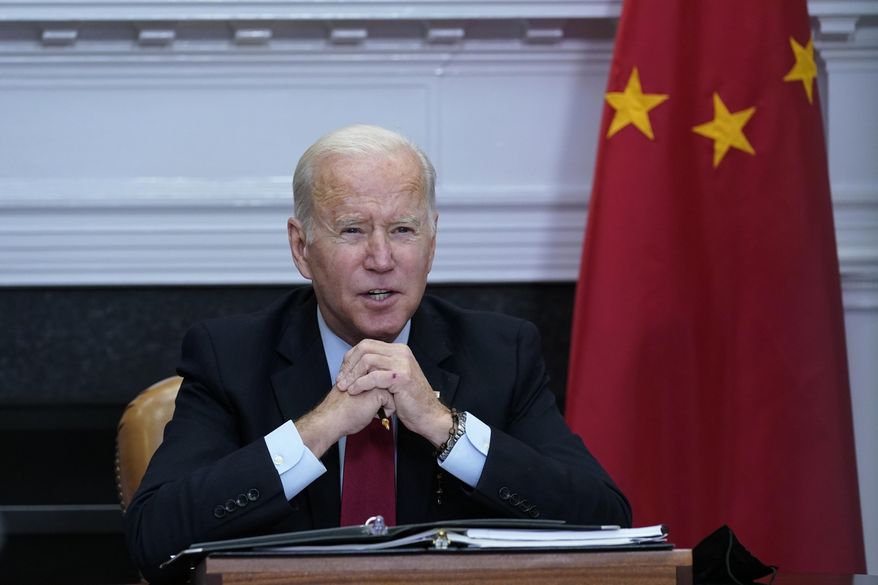 President Joe Biden speaks as he meets virtually with Chinese President Xi Jinping from the Roosevelt Room of the White House in Washington, Monday, Nov. 15, 2021. (AP Photo/Susan Walsh) **FILE**