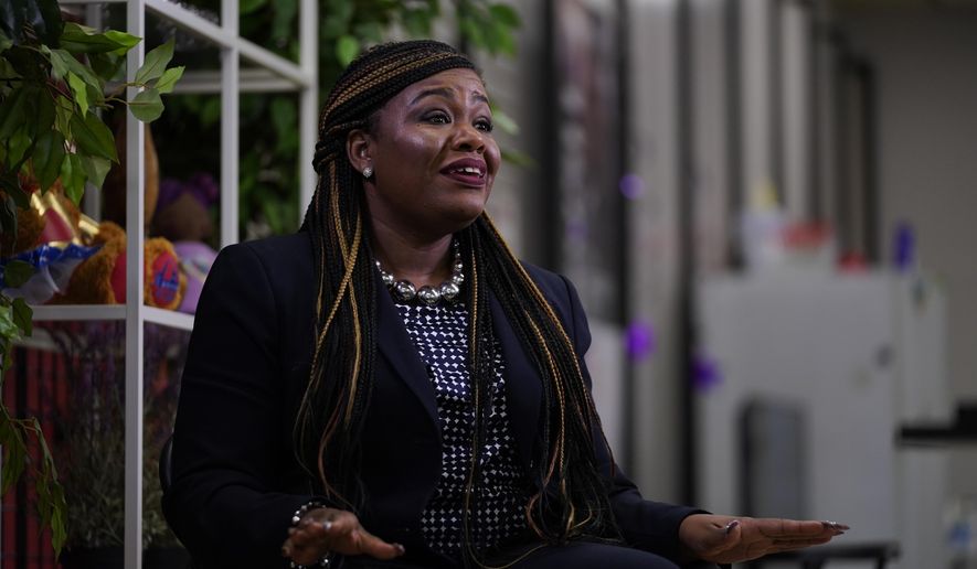 U.S. Rep. Cori Bush, D-Mo., speaks during an interview Friday, Nov. 12, 2021, in Northwoods, Mo. Rep.  Bush claims on social media that white supremacists shot at protesters in Ferguson, Missouri, in 2014, but the city’s police chief says he was unaware of any such incident. She posted on Twitter and Facebook on Monday, Nov. 15, 2021 that during the protests following Brown&#x27;s death, “white supremacists would hide behind a hill near where Michael Brown Jr. was murdered and shoot at us.” Many people responded by questioning if that really happened. (AP Photo/Jeff Roberson)