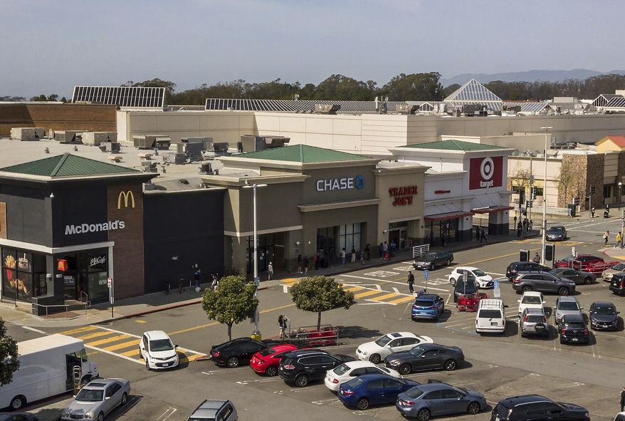 The southern-most corner of Stonestown Galleria including the Target Store is shown on Wednesday, March 24, 2021, in San Francisco. A woman was arrested at the Target store after allegedly stealing more than $40,000 worth of merchandise over the course of 120 visits to the store, officials said Wednesday, Nov. 17.  (Carlos Avila Gonzalez/San Francisco Chronicle via AP)