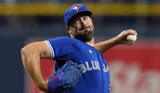 Toronto Blue Jays&#39; Robbie Ray pitches to the Tampa Bay Rays during the first inning of a baseball game Monday, Sept. 20, 2021, in St. Petersburg, Fla. Ray won the AL Cy Young Award on Wednesday, Nov. 17, bouncing back from taking a rare pay cut after a dismal season to capture pitching’s top prize. Ray became the first Toronto pitcher to earn the honor since the late Roy Halladay in 2003.  (AP Photo/Chris O&#39;Meara, File) **FILE**
