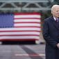 President Joe Biden waits to speak during a visit to the NH 175 bridge over the Pemigewasset River to promote infrastructure spending Tuesday, Nov. 16, 2021, in Woodstock, N.H. (AP Photo/Evan Vucci)