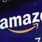 In this Friday, July 27, 2018, file photo, the logo for Amazon is displayed on a screen at the Nasdaq MarketSite.  (AP Photo/Richard Drew, File)