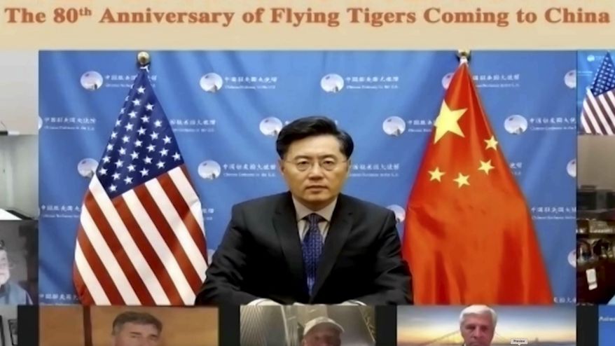 In this screenshot taken on Nov. 16, 2021, and released by Chinese People&#39;s Association of Friendship with Foreign Countries, Qin Gang, China&#39;s ambassador to the U.S. speaks during a video conference call on the 80th anniversary of Flying Tigers Coming to China event in Beijing, China. (Chinese People&#39;s Association of Friendship with Foreign Countries via AP) ** FILE **