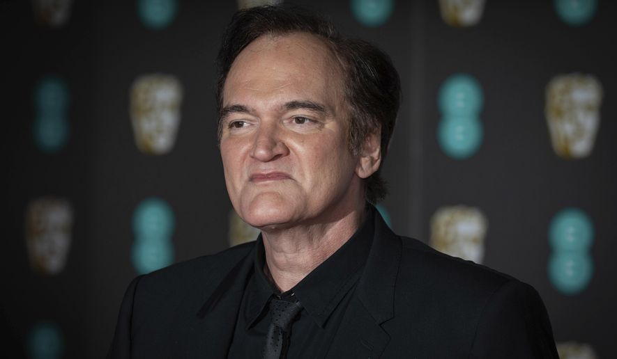 Director Quentin Tarantino poses for photographers upon arrival at the Bafta Film Awards, in central London, Sunday, Feb. 2 2020. In a suit filed Tuesday, Nov. 16, 2021, Miramax is suing director Tarantino over the director’s plans to create and auction off a series of NFTs based on his work on “Pulp Fiction.” (Photo by Vianney Le Caer/Invision/AP, File)