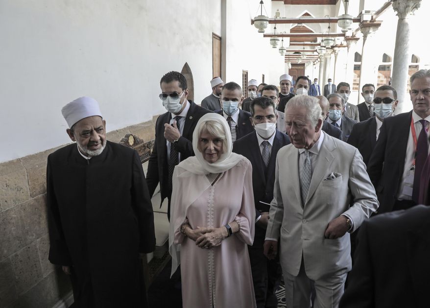 Britain’s Prince Charles and his wife, Camilla visit the Al-Azhar Mosque, the oldest Sunni institution in the Muslim world with Grand Imam of Al-Azhar Mosque Ahmed al-Tayeb, left, in Cairo, Egypt, Thursday, Nov. 18, 2021. The visit is part of the royal couple’s first tour since the start of the coronavirus pandemic. (AP Photo/Mohamed El-Shahed)