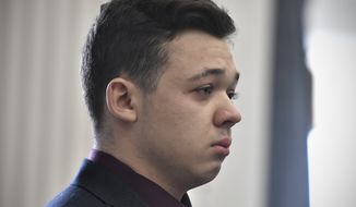 Kyle Rittenhouse keeps his composure while starting to cry as he is found not guilty on all counts at the Kenosha County Courthouse in Kenosha, Wis., on Friday, Nov. 19, 2021. The jury came back with its verdict afer close to 3 1/2 days of deliberation.  (Sean Krajacic/The Kenosha News via AP, Pool)