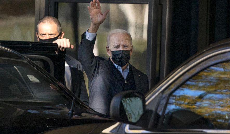 President Joe Biden arrives at Walter Reed National Military Medical Center for a physical exam, Friday, Nov. 19, 2021, in Bethesda, Md. (AP Photo/Evan Vucci)