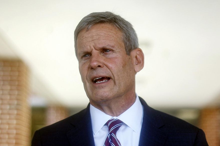 Tennessee Gov. Bill Lee speaks to local media at the front of McConnell Elementary School on Aug. 11, 2021 in Hixson, Tenn. Emails obtained by The Associated Press show that Lee’s office warned top legislative staffers that a bill limiting public health measures during the COVID pandemic would violate federal law. They passed it anyway and the Republican governor signed it into law even though his legislative counsel warned that Tennessee risks losing federal funding for violating the Americans with Disabilities Act. (Troy Stolt/Chattanooga Times Free Press via AP, File)