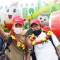 Tourists pose for a photo after landing on Phu Quoc island, in Vietnam, Saturday, Nov. 20, 2020. More than 200 foreign tourists arrived on Vietnam&#39;s largest Phu Quoc island on Saturday, being the first to visit the Southeast Asian country after nearly two years of border closure due to COVID-19. (VietjetAir via AP)