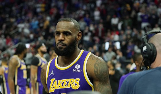 Los Angeles Lakers forward LeBron James is ejected after fouling Detroit Pistons center Isaiah Stewart during the second half of an NBA basketball game, Sunday, Nov. 21, 2021, in Detroit. (AP Photo/Carlos Osorio) **FILE**