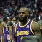 Los Angeles Lakers forward LeBron James is ejected after fouling Detroit Pistons center Isaiah Stewart during the second half of an NBA basketball game, Sunday, Nov. 21, 2021, in Detroit. (AP Photo/Carlos Osorio) **FILE**