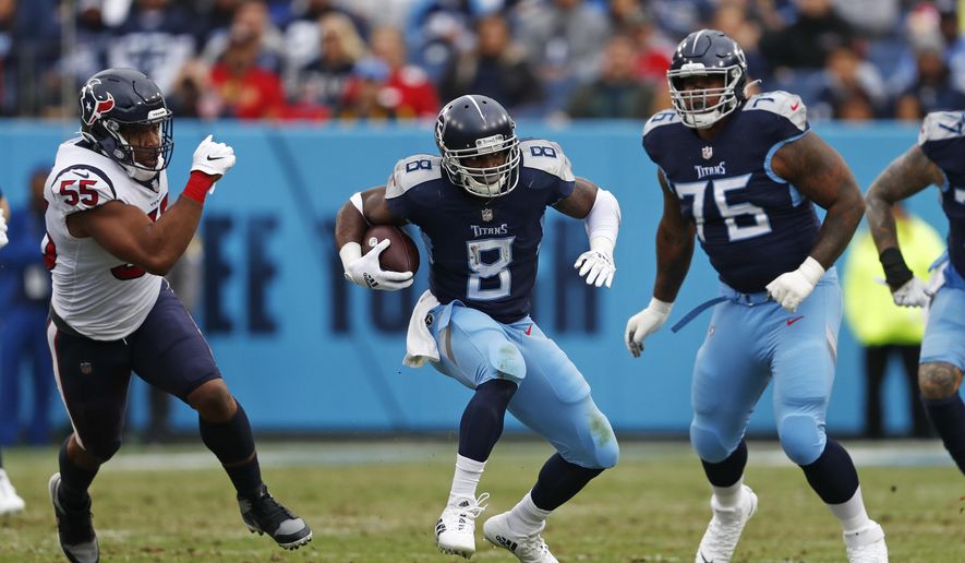 Tennessee Titans running back Adrian Peterson (8) carries the ball past Houston Texans defensive end DeMarcus Walker (55) in the first half of an NFL football game Sunday, Nov. 21, 2021, in Nashville, Tenn. (AP Photo/Wade Payne) **FILE**