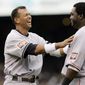 American League&#x27;s Alex Rodriguez, left, of the New York Yankees, laughs with American League&#x27;s David Ortiz, of the Boston Red Sox, after Rodriguez grounded out to end the first inning during the All-Star baseball game in San Francisco, Tuesday, July 10, 2007. (AP Photo/ Eric Risberg) **FILE**