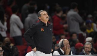 In this file photo, Maryland head coach Mark Turgeon reacts during the first half of an NCAA college basketball game against George Mason, Wednesday, Nov. 17, 2021, in College Park, Md. (AP Photo/Nick Wass)