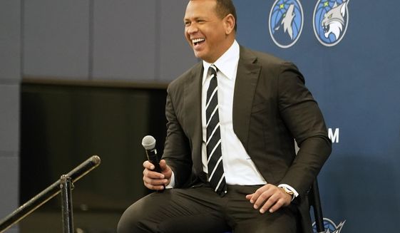 Baseball great Alex Rodriguez laughs during a press conference after Minnesota Timberwolves team owner Glen Taylor introduced Rodriguez and Marc Lore as the new ownership partners. (AP Photo/Jim Mone, File)
