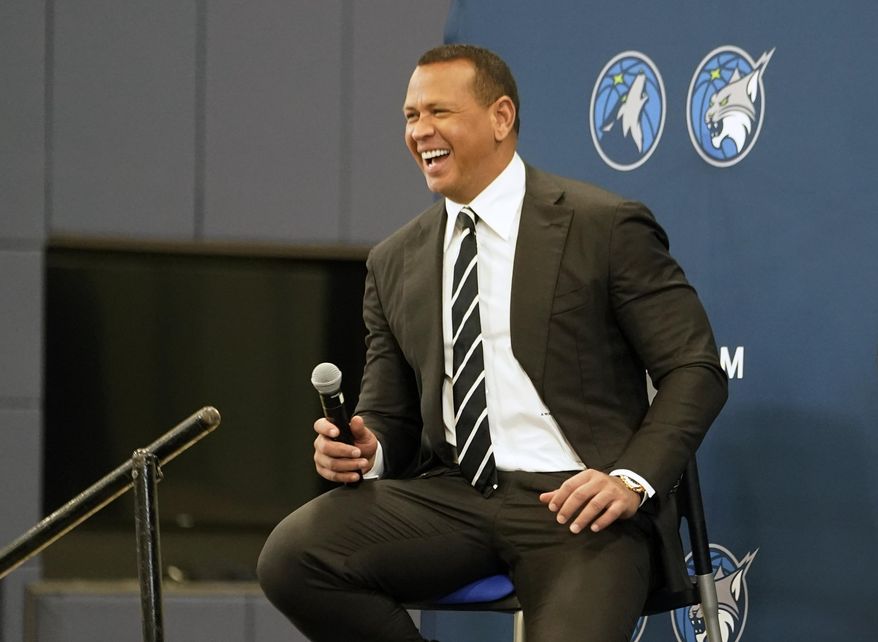 Baseball great Alex Rodriguez laughs during a press conference after Minnesota Timberwolves team owner Glen Taylor introduced Rodriguez and Marc Lore as the new ownership partners. (AP Photo/Jim Mone, File)