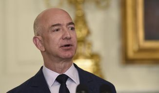 Jeff Bezos, the founder and CEO of Amazon.com, speaks in the State Dining Room of the White House in Washington, May 5, 2016. Former President Barack Obama’s foundation announced Monday, Nov. 22, 2021, that Bezos has gifted the organization $100 million, which it says is the largest individual contribution it has received to date. (AP Photo/Susan Walsh, File)