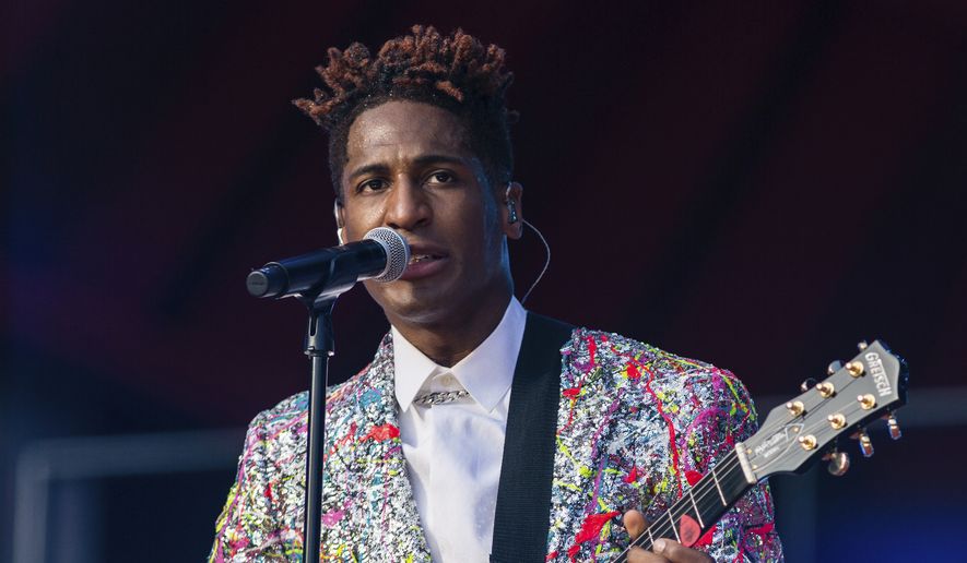 FILE - Jon Batiste performs during the Global Citizen festival on Sept. 25, 2021 in New York. Batiste received 11 Grammy Award nominations, including ones for album of the year, record of the year, and best R&amp;B album. (AP Photo/Stefan Jeremiah, File)