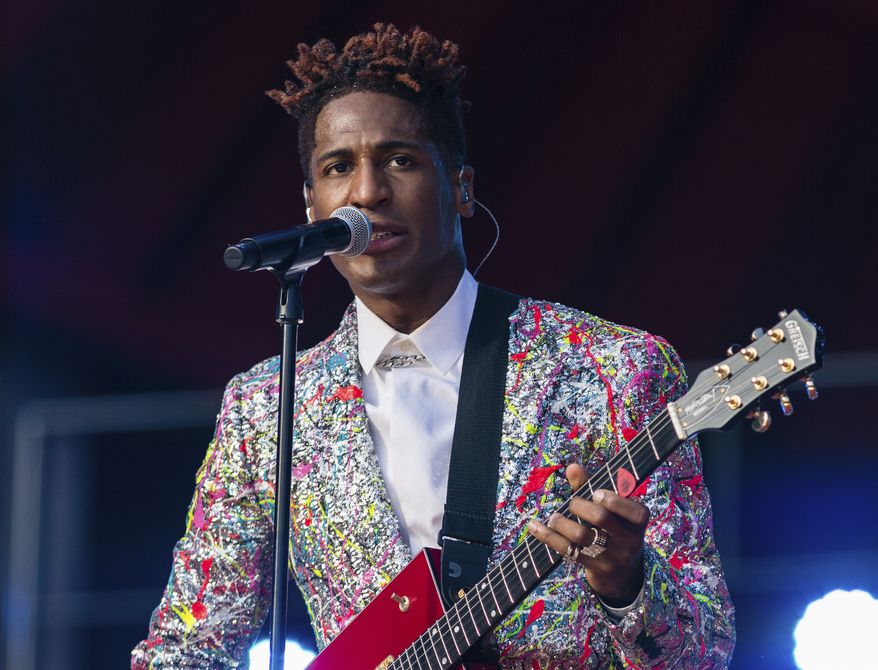 FILE - Jon Batiste performs during the Global Citizen festival on Sept. 25, 2021 in New York. Batiste received 11 Grammy Award nominations, including ones for album of the year, record of the year, and best R&amp;B album. (AP Photo/Stefan Jeremiah, File)