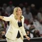 Maryland head coach Brenda Frese points during the first half of an NCAA college basketball game against Baylor, Sunday, Nov. 21, 2021, in College Park, Md. (AP Photo/Nick Wass) **FILE**