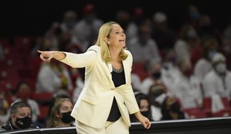 Maryland head coach Brenda Frese points during the first half of an NCAA college basketball game against Baylor, Sunday, Nov. 21, 2021, in College Park, Md. (AP Photo/Nick Wass) **FILE**