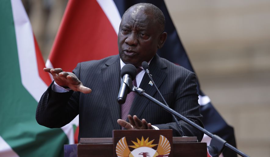 South African President Cyril Ramaphosa addresses the media after meeting with his Kenyan counterpart Uhuru Kenyatta in Pretoria, South Africa, Tuesday Nov. 23, 2021. Travel restrictions imposed on South Africa and other African nations for telling the world about the omicron variant are hypocritical, harsh and not supported by science, South Africa&#39;s president said Monday, recalling the phrase used by the U.N. chief, who called such measures “travel apartheid.” (AP Photo/Themba Hadebe)