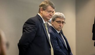 William &quot;Roddie&quot; Bryan (right) stands next to his attorney Kevin Gough after the jury handed down their verdict in the Glynn County Courthouse, Wednesday, Nov. 24, 2021, in Brunswick, Ga. Greg McMichael and his son, Travis McMichael, and  Bryan, charged in the death of Ahmaud Arbery were convicted of murder Wednesday in the fatal shooting that became part of a larger national reckoning on racial injustice. (AP Photo/Stephen B. Morton, Pool)