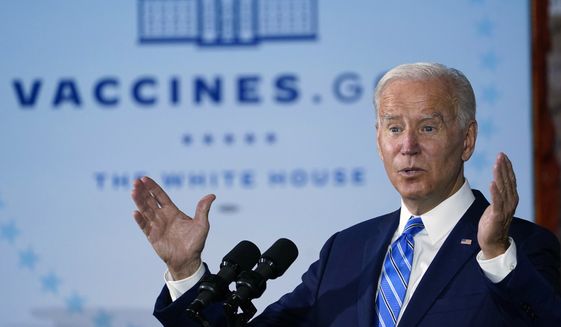In this file photo, President Joe Biden speaks about COVID-19 vaccinations after touring a Clayco Corporation construction site for a Microsoft data center in Elk Grove Village, Ill., on Oct. 7, 2021.  (AP Photo/Susan Walsh, File)