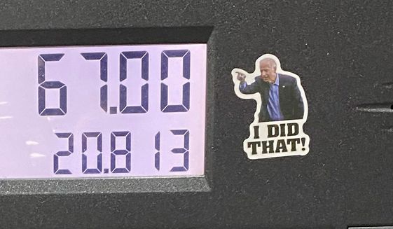 Stickers featuring President Joe Biden pointing at the gas total and saying &quot;I did that!&quot; have been spotted at several gas stations around the country. (Kerry Picket/The Washington Times)