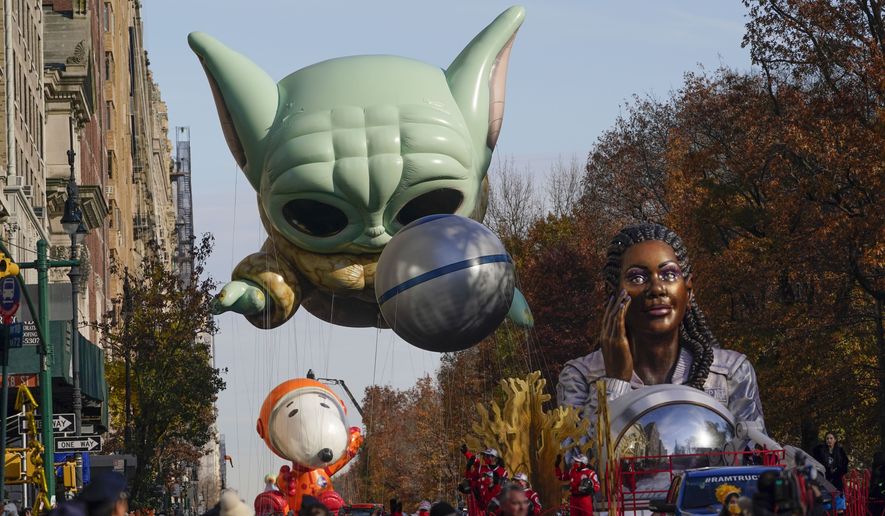Floats move down Central Park West during the Macy&#39;s Thanksgiving Day Parade in New York, Thursday, Nov. 25, 2021. The parade is returning in full, after being crimped by the coronavirus pandemic last year. (AP Photo/Seth Wenig)