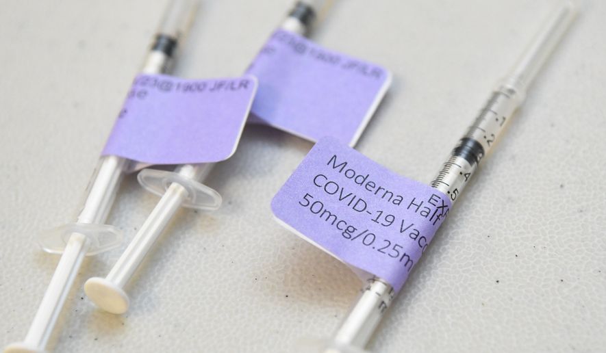 Syringes of Moderna COVID-19 booster vaccine sit on a table at Lehigh Valley Hospital-Schuylkill East Norwegian Street in Pottsville, Pa., on Tuesday, Nov. 23, 2021.  (Lindsey Shuey/Republican-Herald via AP)