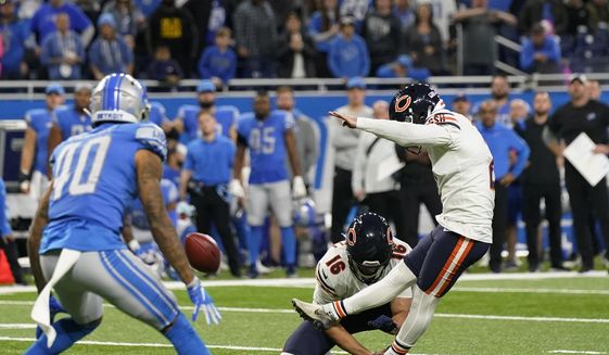 Chicago Bears kicker Cairo Santos kicks the winining field goal with time expiring to defeat the Detroit Lions 16-14 during the second half of an NFL football game, Thursday, Nov. 25, 2021, in Detroit. (AP Photo/Carlos Osorio)