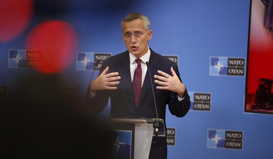 NATO Secretary General Jens Stoltenberg speaks to the press ahead of a meeting of NATO Foreign Affairs Ministers to be held on Nov. 30-Dec.1, at the NATO headquarters, in Brussels, Belgium, Friday, Nov. 26, 2021. (AP Photo/Olivier Matthys)