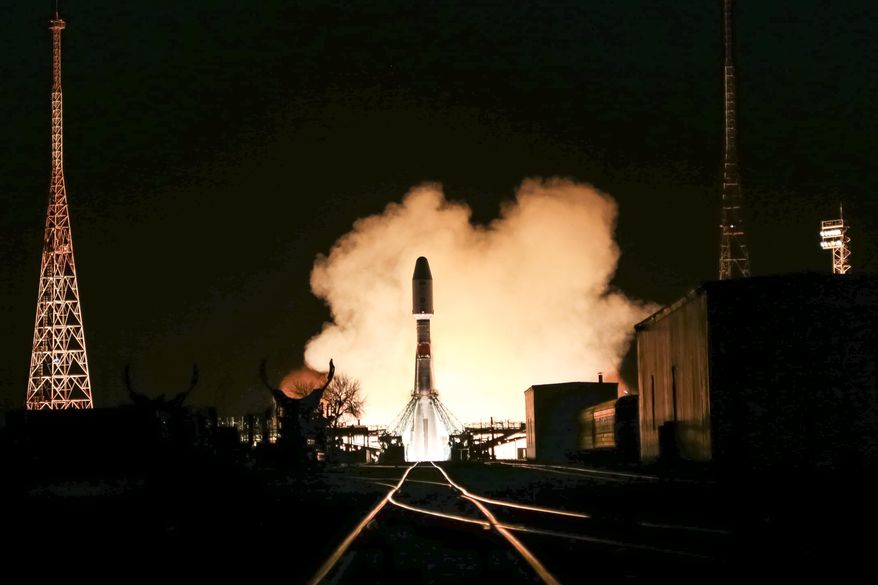 In this photo provided by the Roscosmos Space Agency Press Service, the Soyuz rocket blasts off from the launch pad at Russia's space facility in Baikonur, Kazakhstan, Wednesday, Nov. 24, 2021. A Russian rocket blasted off successfully on Wednesday to deliver a new docking module to the International Space Station. The Soyuz rocket lifted off as scheduled at 6:06 p.m. (1306 GMT) from the Russian launch facility in Baikonur, Kazakhstan, carrying the Progress cargo ship with the Prichal (Pier) docking module attached to it. (Roscosmos Space Agency Press Service photo via AP)